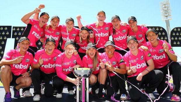 All smiles: The Sixers celebrate scooping the ultimate prize after a sweltering afternoon at the WACA.