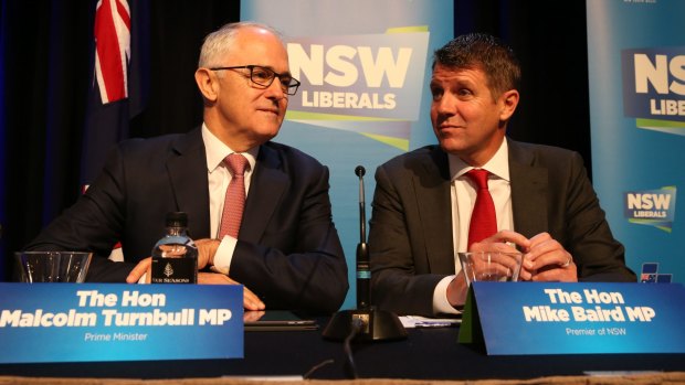 United front: Mr Turnbull and Mr Baird speak at Saturday's NSW Liberal Party state conference.