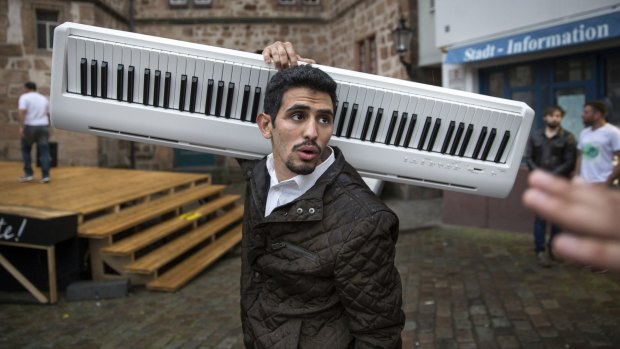 Ayham al-Ahmad after a concert in Marburg, Germany, in May.