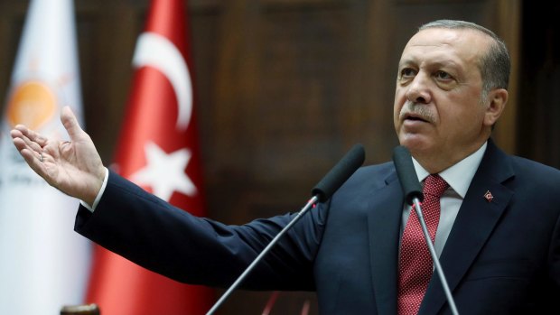 Turkey's Presiden Recep Tayyip Erdogan addresses his supporters at the parliament in Ankara, Turkey.