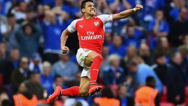 Keeping his eye on the prize: Arsenal's Alexis Sanchez.