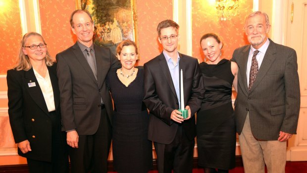 Edward Snowden receives the Sam Adams Associates for Integrity in Intelligence Award alongside British WikiLeaks journalist Sarah Harrison (second right), who took Snowden from Hong Kong to Moscow and obtained his asylum in 2013.