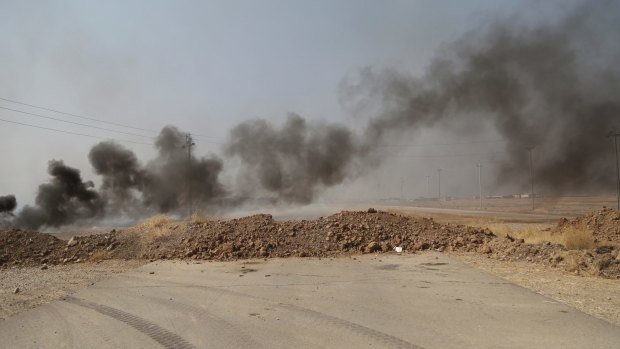 Smoke rises from Islamic state positions after an airstrike by coalition forces near Mosul.