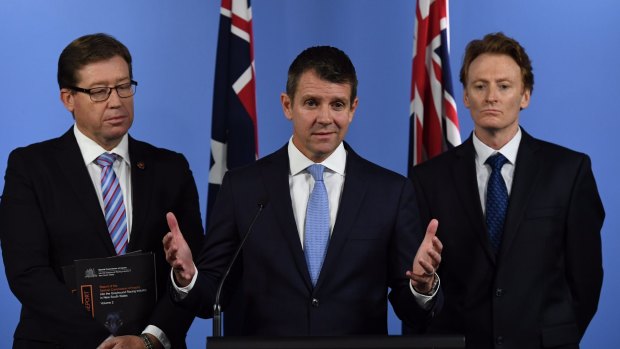 NSW Premier Mike Baird, Deputy Premier Troy Grant with Steve Coleman, CEO of RSPCA NSW, announcing the ban on Thursday. 