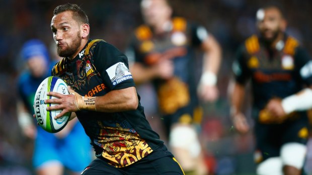Main man:  Aaron Cruden of the Chiefs runs in for a try.