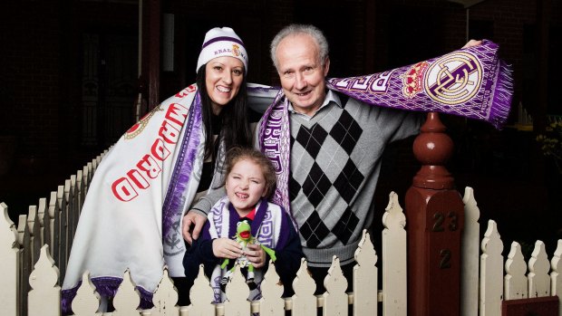 Real Madrid fans Anabel Munoz-Di Paolo, with father Francisco Munoz, 72, and daughter Monica Di Paolo, 6. 