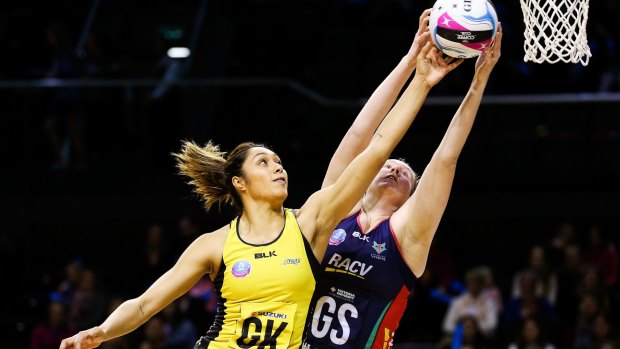 Phoenix Karaka, of Central Pulse, and Emma Ryde, of the Melbourne Vixens, compete for the ball during an ANZ Championship match.