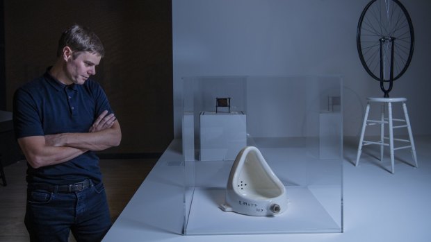 Nick Chambers with Marcel Duchamp's Fountain and Bicycle Wheel.  