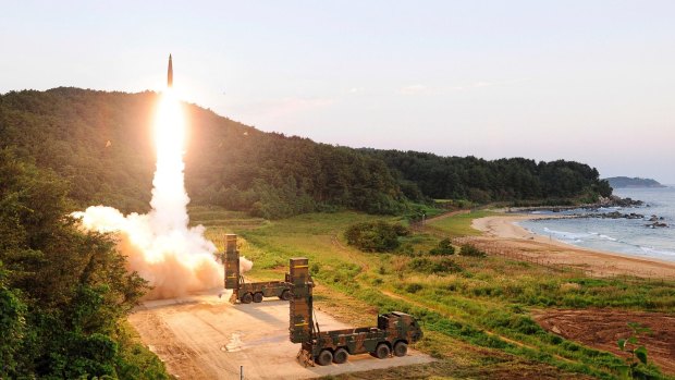A Hyunmoo II ballistic missile is fired during an exercise at an undisclosed location in South Korea part of a live-fire exercise simulating an attack on North Korea's nuclear test site.