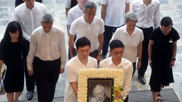 PM Lee Hsien Loong, centre, with siblings Lee Hsien Yang, second from left, and Lee Wei Ling, far right, at their father Lee Kuan Yew's state funeral in 2015.