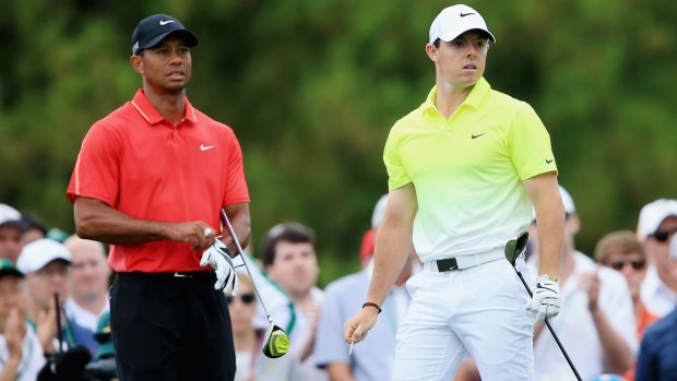 A marketer's dream: Tiger Woods and Rory McIlroy wait on the tenth tee during the final round.