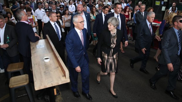 Turnbull and Ms May visit Borough Market in London.