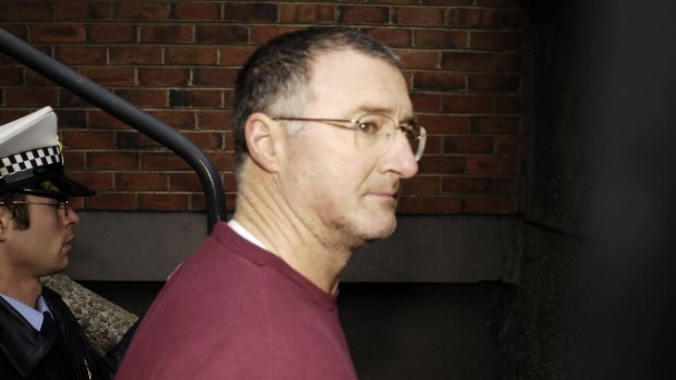 Potter in Tasmanian police custody in 2008.