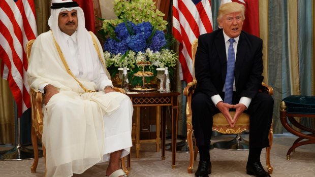 Donald Trump with Qatar's ruler Sheikh Tamim bin Hamad al-Thani in Riyadh in May. Mr Trump was hoping to forge unity among Washington's Middle East allies to face Islamic State and Iran.