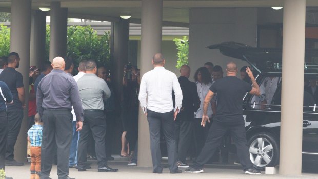 Relatives and friends perform the haka outside David Petersen's funeral on Wednesday. 