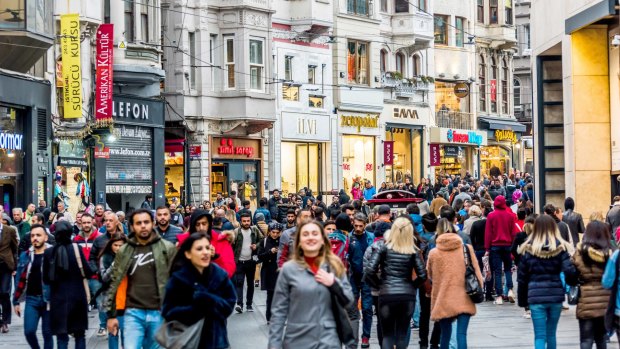 ISTANBUL, TURKEY - APRIL 1, 2019: Crowd of people on Istiklal Caddesi, Taksim. Touristic popular destination Taksim Istiklal Street. Beyoglu, Istanbul, Turkey.Â 