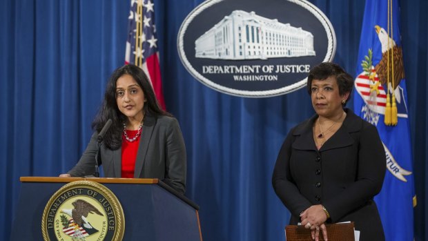 Assitant Attorney-General Vanita Gupta,  joined by Attorney-General Loretta Lynch, speaks at a news conference in Washington.