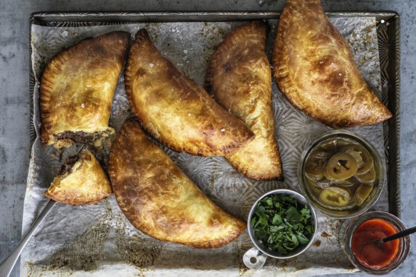 Empanadas filled with beef, chorizo and roasted tomatoes.