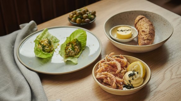 Kingfish rillettes in lettuce cups and school prawns with Korean chilli salt are among the large selection of snacks on the menu.