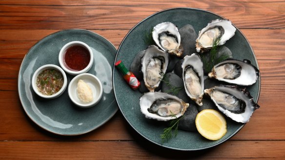 Oysters with red wine mignonette, fresh horseradish and a Thai-style dressing.