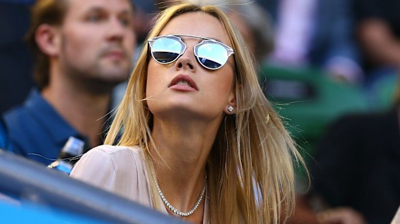 Support from the stands: Ester Satorova, Tomas Berdych's fiancee, looks on.