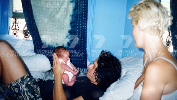 Hutchence and Paula Yates with newborn Tiger Lily.
