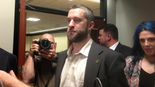 Television actor Dustin Diamond exits the courtroom on Friday night after a 12-person jury convicted him of two misdemeanours stemming from a barroom fight.