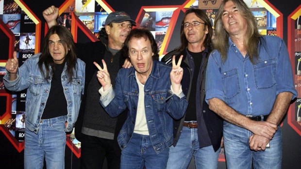 Malcolm Young, Brian Johnson, Angus Young, Phil Rudd and Cliff Williams from AC/DC at the Apollo Hammersmith in London in 2003.