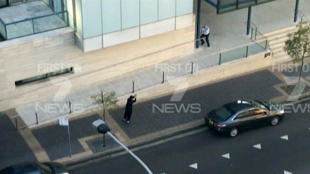 Police take aim at Farhad Jabar after he killed Curtis Cheng outside Parramatta police headquarters.