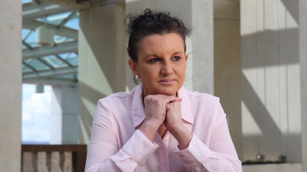 Senator Lambie breaks away from other PUP senators to back Labor's disallowance motion.