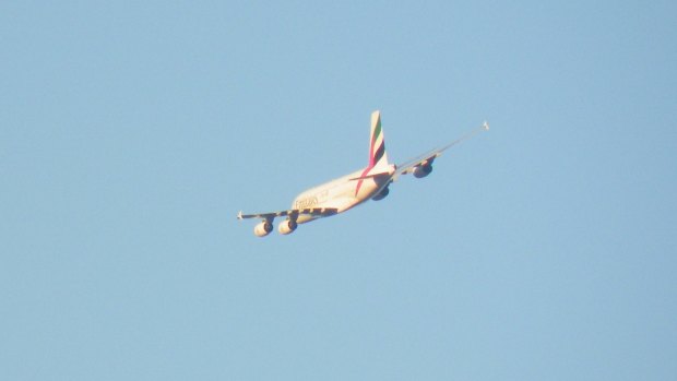 The A380 as seen from the ground as it makes its way over Perth