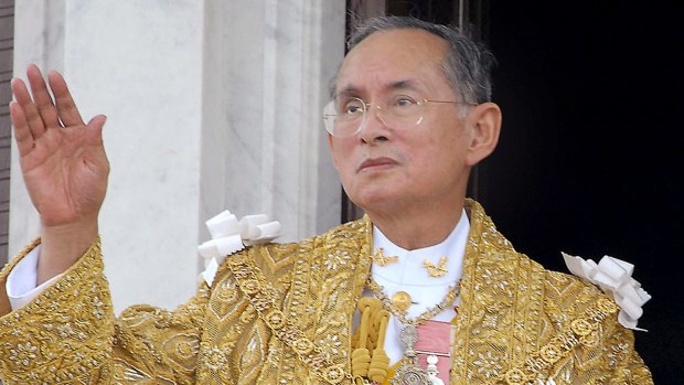 Thailand's King Bhumibol Adulyadej acknowledges the crowd in Bangkok during the celebrations of the 60th anniversary of his accession to the throne in 2006.