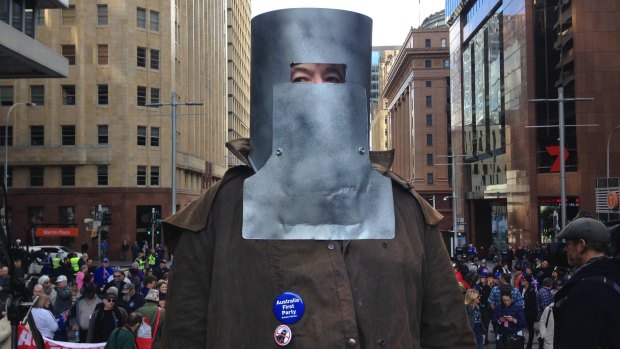 Victor Waterson dressed as Ned Kelly, at the Reclaim Australian Rally in Martin Place.