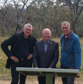 Left to right, the ACT Conservation Council's Larry O'Loughlin, left, with Planning Minister Mick Gentleman, and Rod Griffiths, who leads a 306 kilometre circuit of the ACT's border, at Namadgi on Friday.