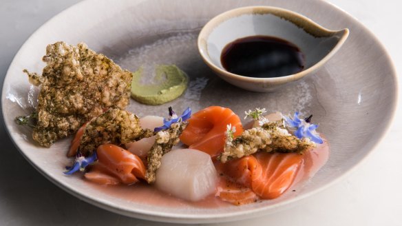 Ora king salmon, Tasmanian scallop, kombu cracker, pink ginger, dashi tea and horseradish. 