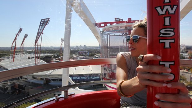 Royal Easter Show underway: The view goes on and on, and round and round on The Twister.