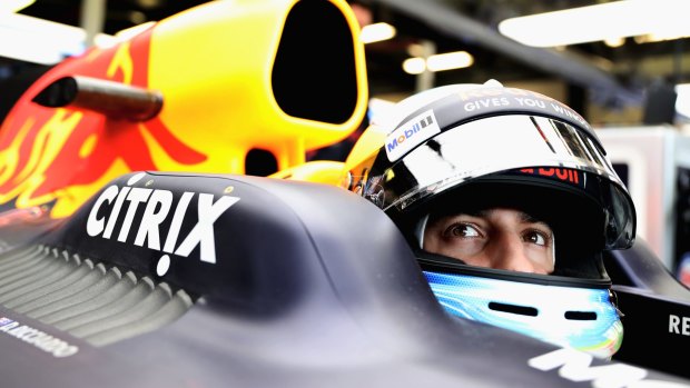 New season: Daniel Ricciardo sits in his car during practice for the Australian Formula One Grand Prix at Albert Park.