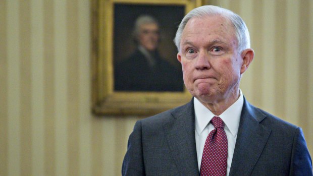 Jeff Sessions, US attorney-general, pauses after being sworn in by Vice President Mike Pence in the Oval Office on February 9.