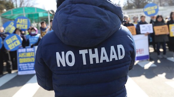 Protesters outside the Defence Ministry in Seoul.