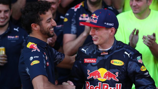 Daniel Ricciardo congratulates Max Verstappen.