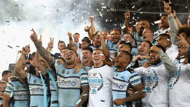 The Cronulla Sharks celebrate their victory over Melbourne Storm in the grand final.