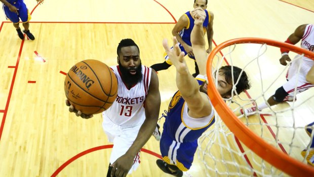 Dwight Howard, of the Houston Rockets, shoots against Andrew Bogut, of the Golden State Warriors, in game four of the Western Conference finals.