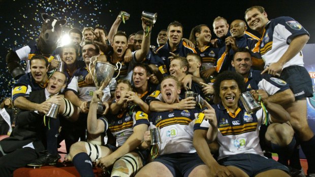 Champions: The Brumbies celebrate in 2004.