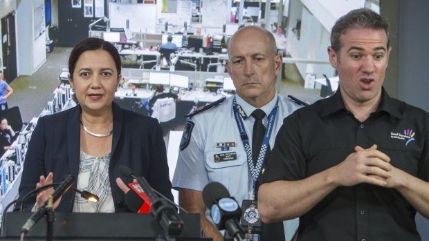 Interpreter Mark Cave, coined '#SignGuy' by media and social media, at the State Disaster Coordination Centre for a press conference with premier Annastacia Palaszczuk and emergency officials.