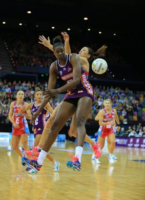 Aerial challenge: Romelda Aiken and Sharni Layton contest possession as the Queensland Firebirds claimed the Australian conference title with a 55-44 win over the NSW Swifts.