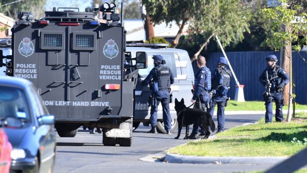 Heavily armed police at the scene in Brougham Avenue, Wyndham Vale last year.
