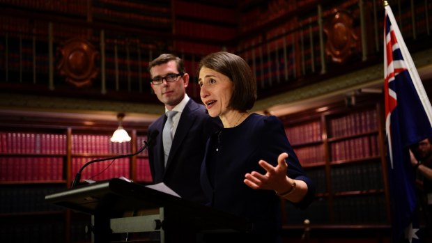 NSW premier Gladys Berejiklian and tresaurer Dominic Perrottet have agreed a deal to sell the state's land titles unit. 