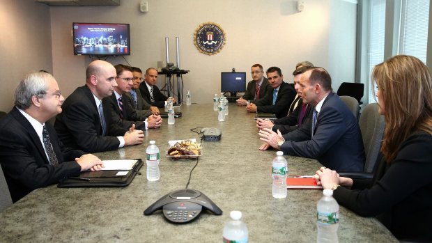 Then prime minister Tony Abbott meets with the joint FBI-New York Police Department Joint Terrorism Task Force during a visit to New York in September 2014. 