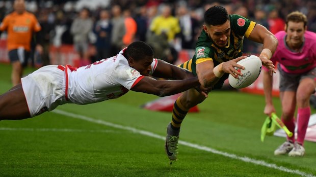 Valentine Holmes touches down against England at London's Olympic Stadium on Sunday.