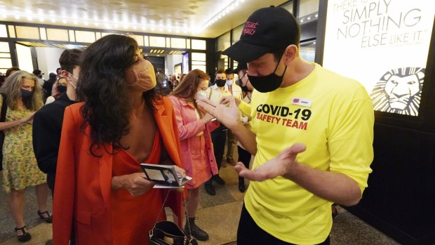 A theatergoer show proof of vaccination before a performance of The Lion King, on Broadway, in New York. The rules around vaccination passports in the US vary from state to state.